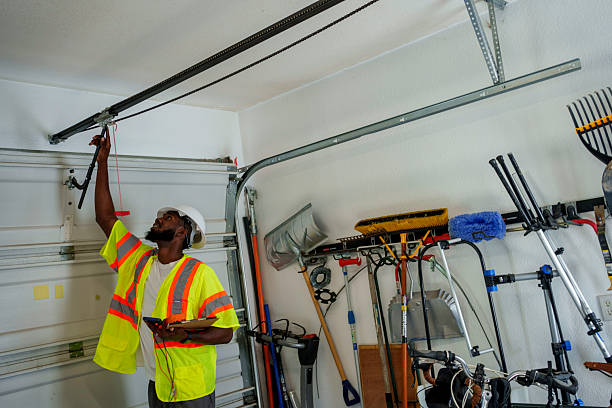 Professional Garage Door Panel Replacement technician working in Madison County County, OH